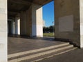 Entrance to the dark corridor from the arches of a geometric light old dirty building in a poor area of Ã¢â¬â¹city of Russia